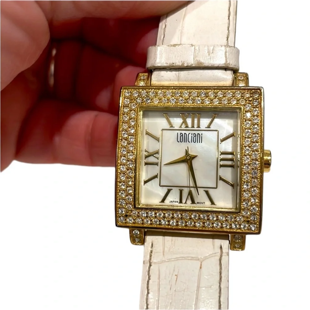 Lanciani Stainless Steel watch with white leather band. GUC